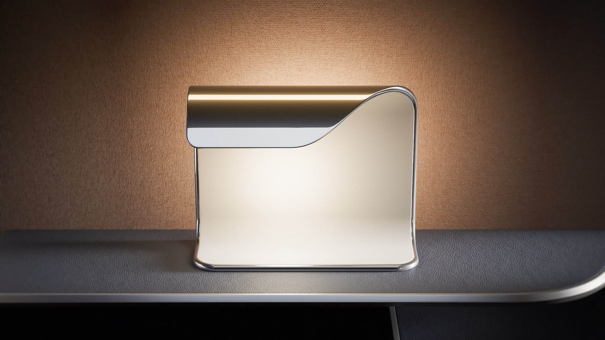Closeup, a modern lamp. It sits on the side table visible in a previous image. It is unusual in structure: mostly a vertical surface of a semi-gloss white with nickel-coloured metal behind, the top rolls towards us and has a shape reminiscent of the Concorde wing. Light is shone onto the white surface and the mid-brown wall fabric effect behind.