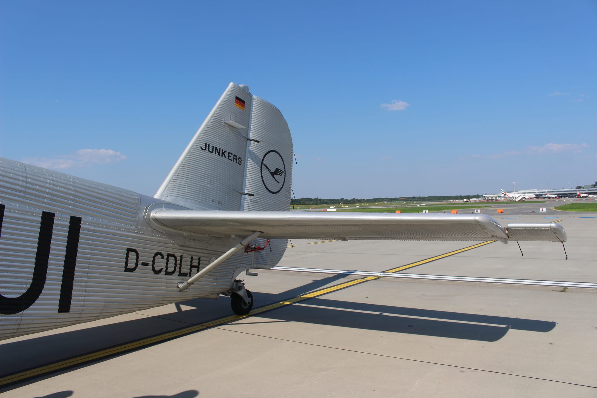 Shot of the rear empennage from the rear right of the aircraft on the ground.