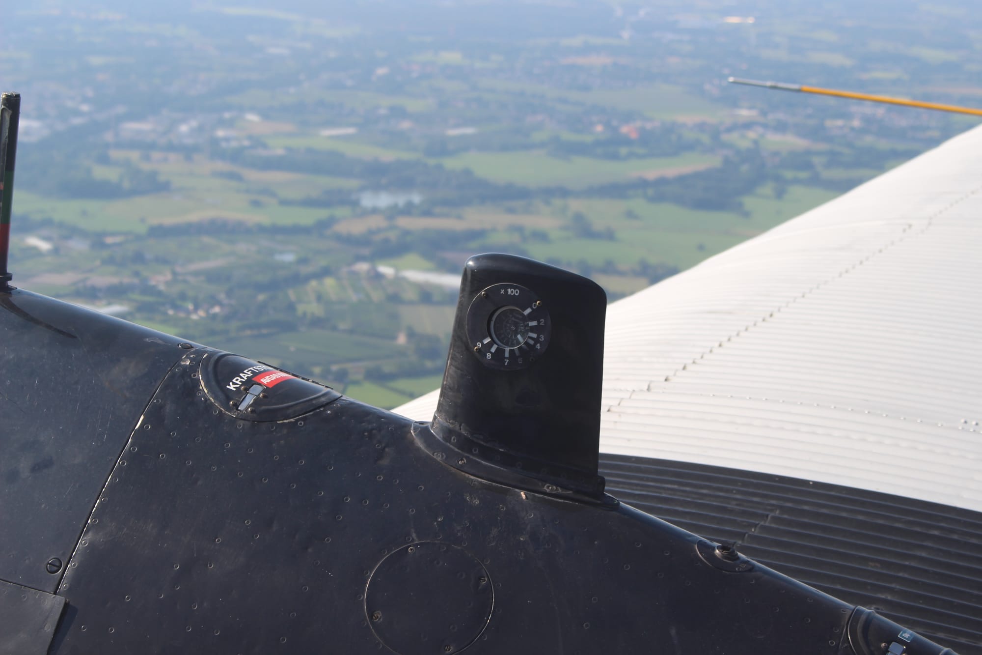 Closeup on an engine rev gauge, extending above the main engine in a small fin.
