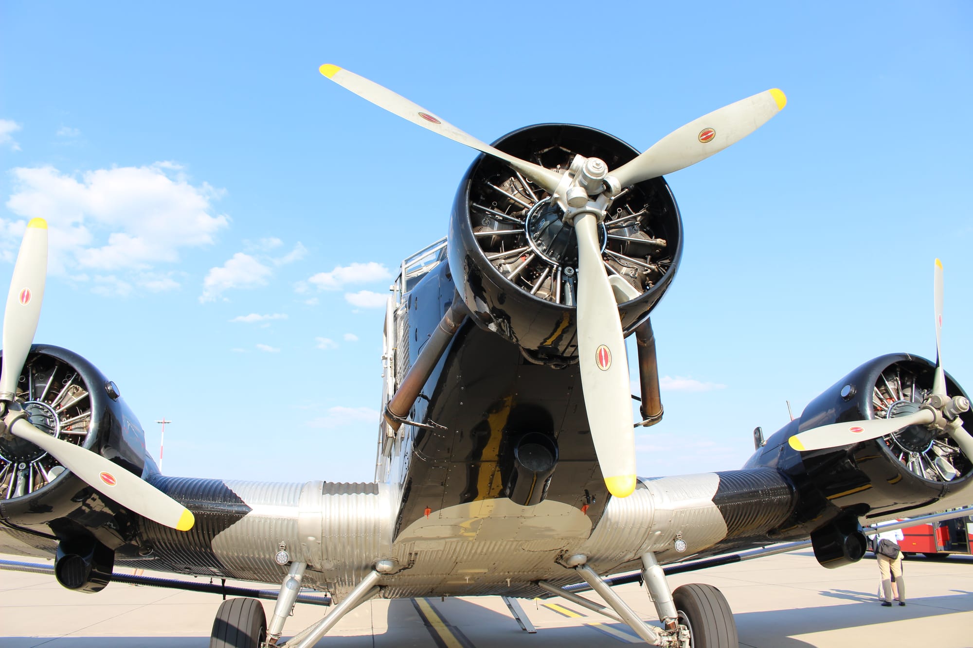 Closeup from the nose on the Ju52, showing all three piston engines and tri-blased propellers.