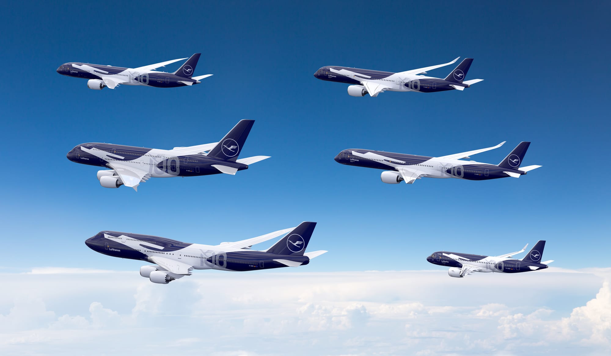 Six Lufthansa aircraft — a 787-9, A380, 747-8, A350-900, A350-1000 and A320neo — in the white-crane-on-navy-background centenary livery.