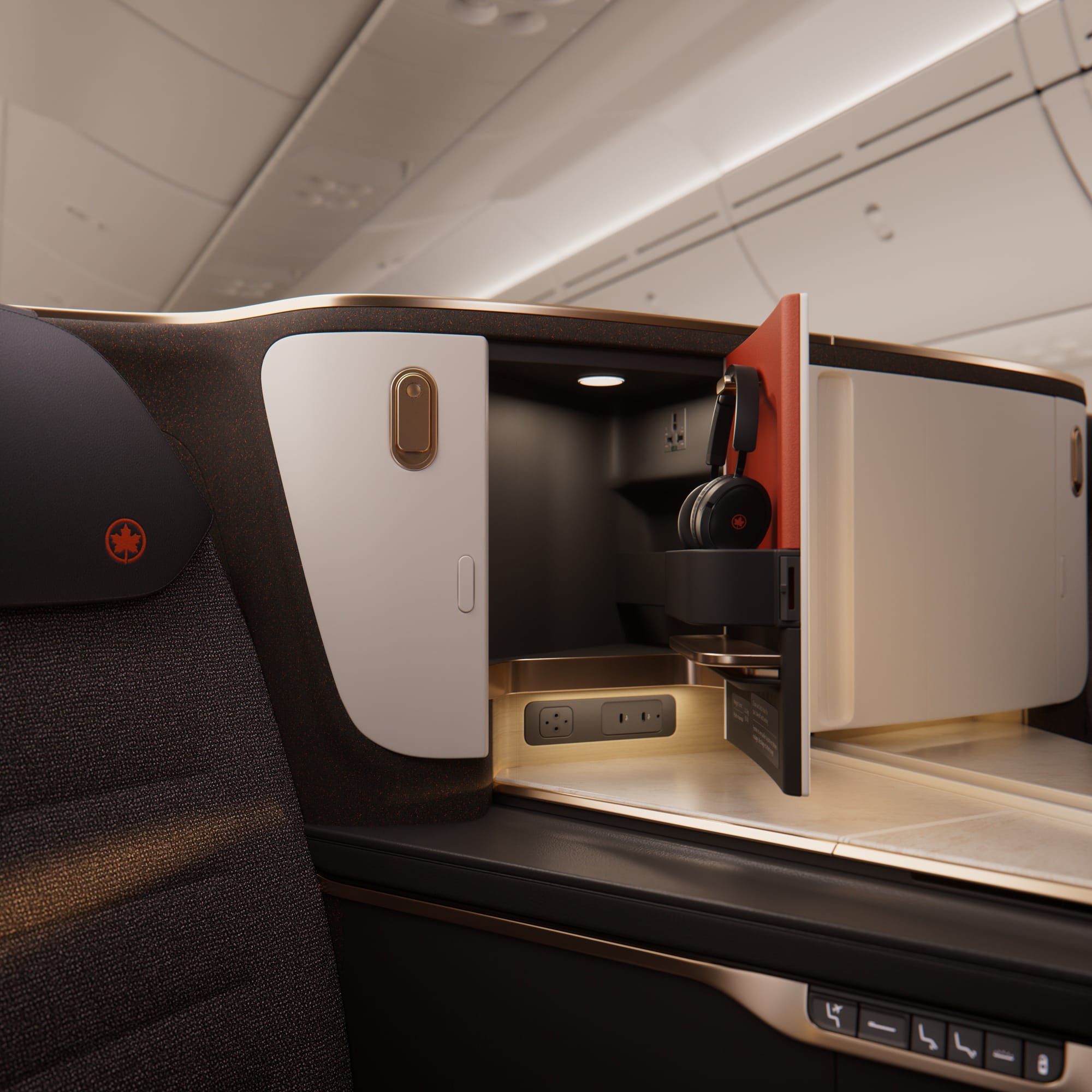 Closeup on the side storage locker of the Glowing Hearted Elevate Ascent seat, with its bronze accents and red pop inside the cupboard, and a seat cover with mostly grey natural tones.