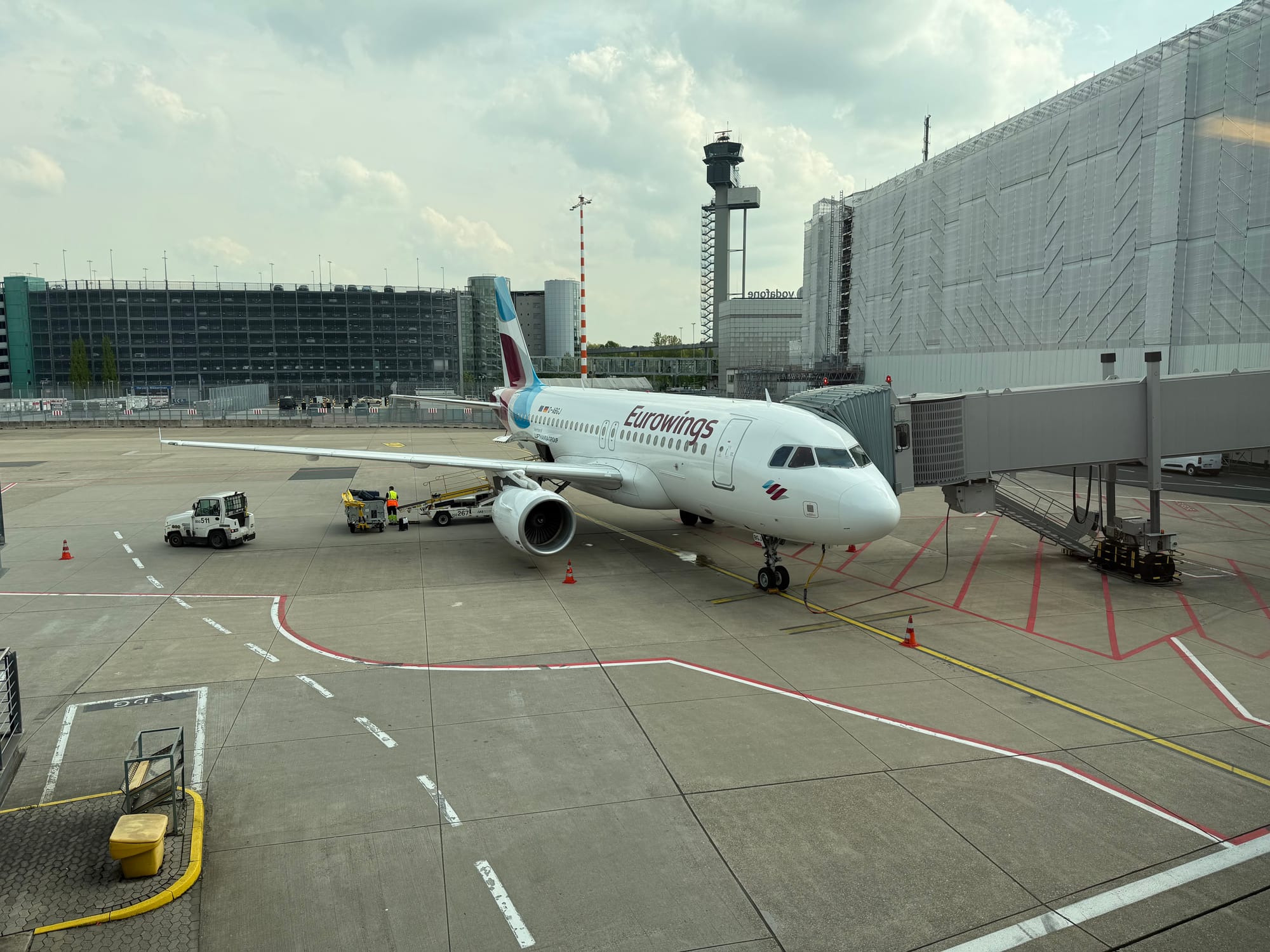A Eurowings A319 sitting at a gate in Dusseldorf