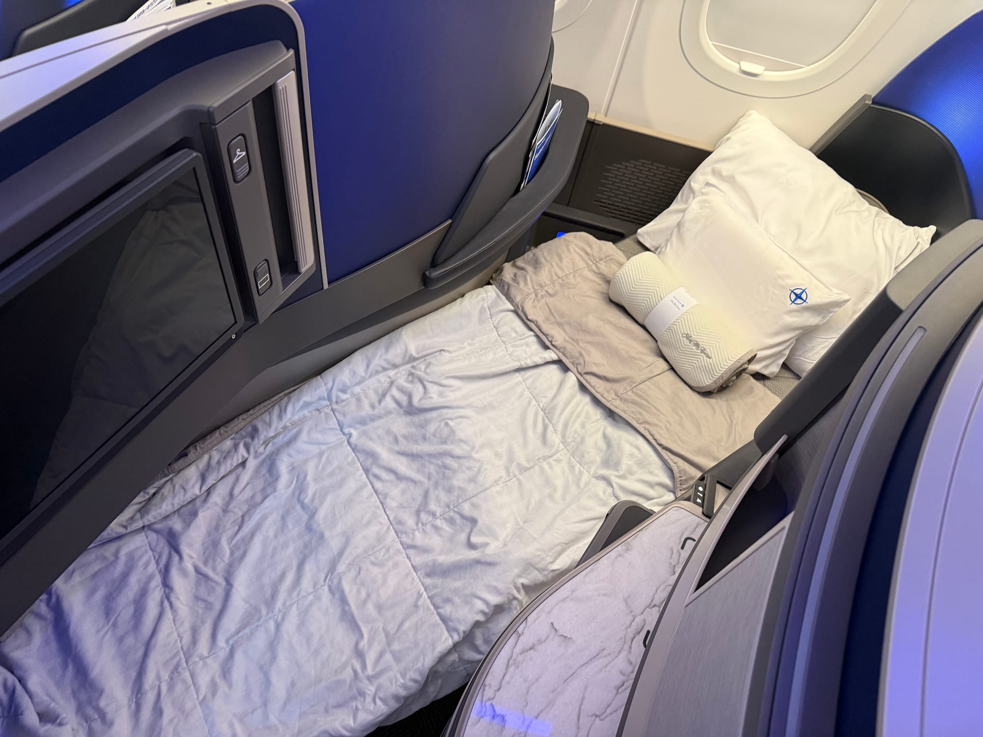 The same seat in flat mode, with linens on top.