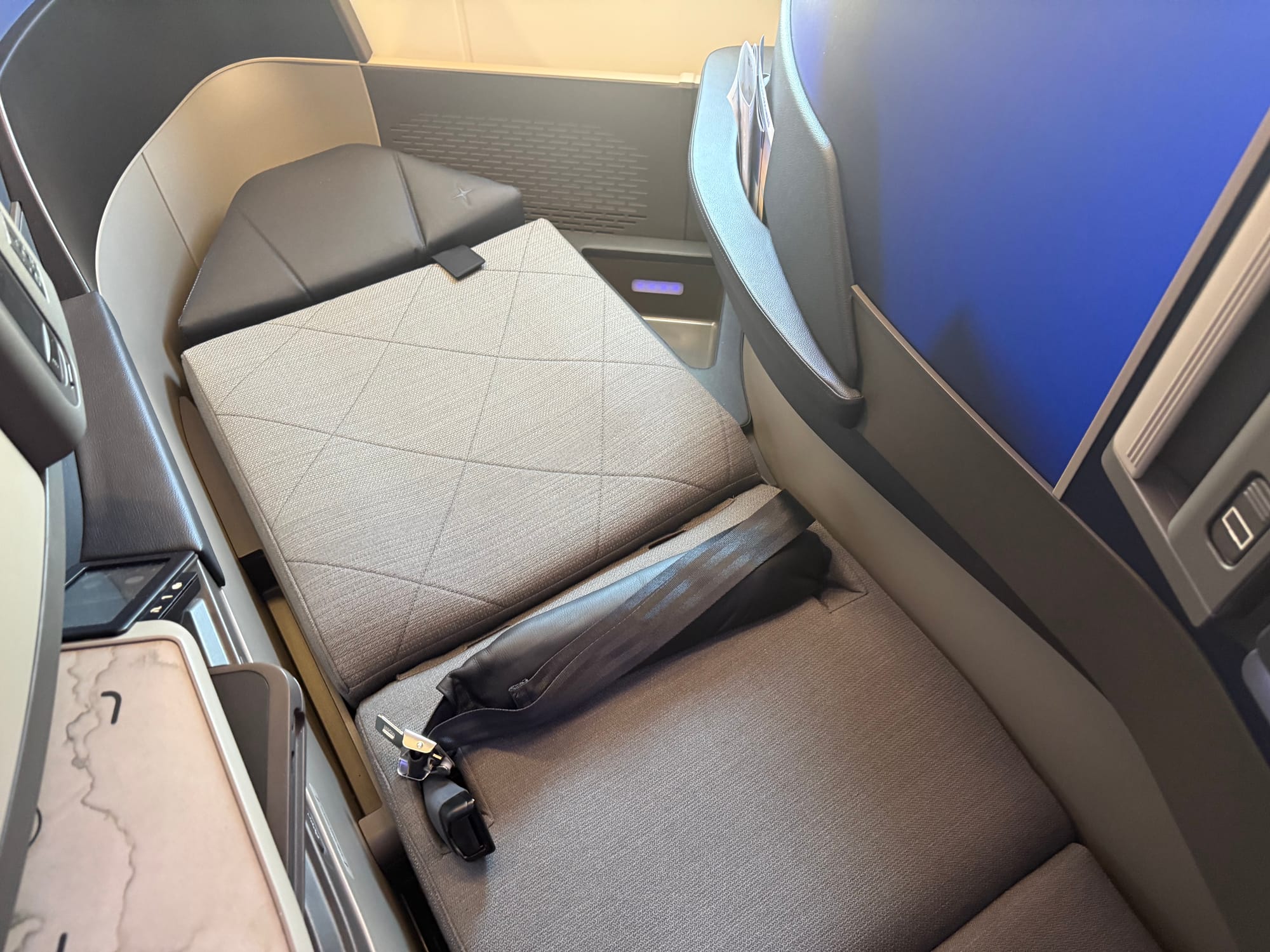 Looking down on the reclined seat, showing various angles and curves, none of which really go together.