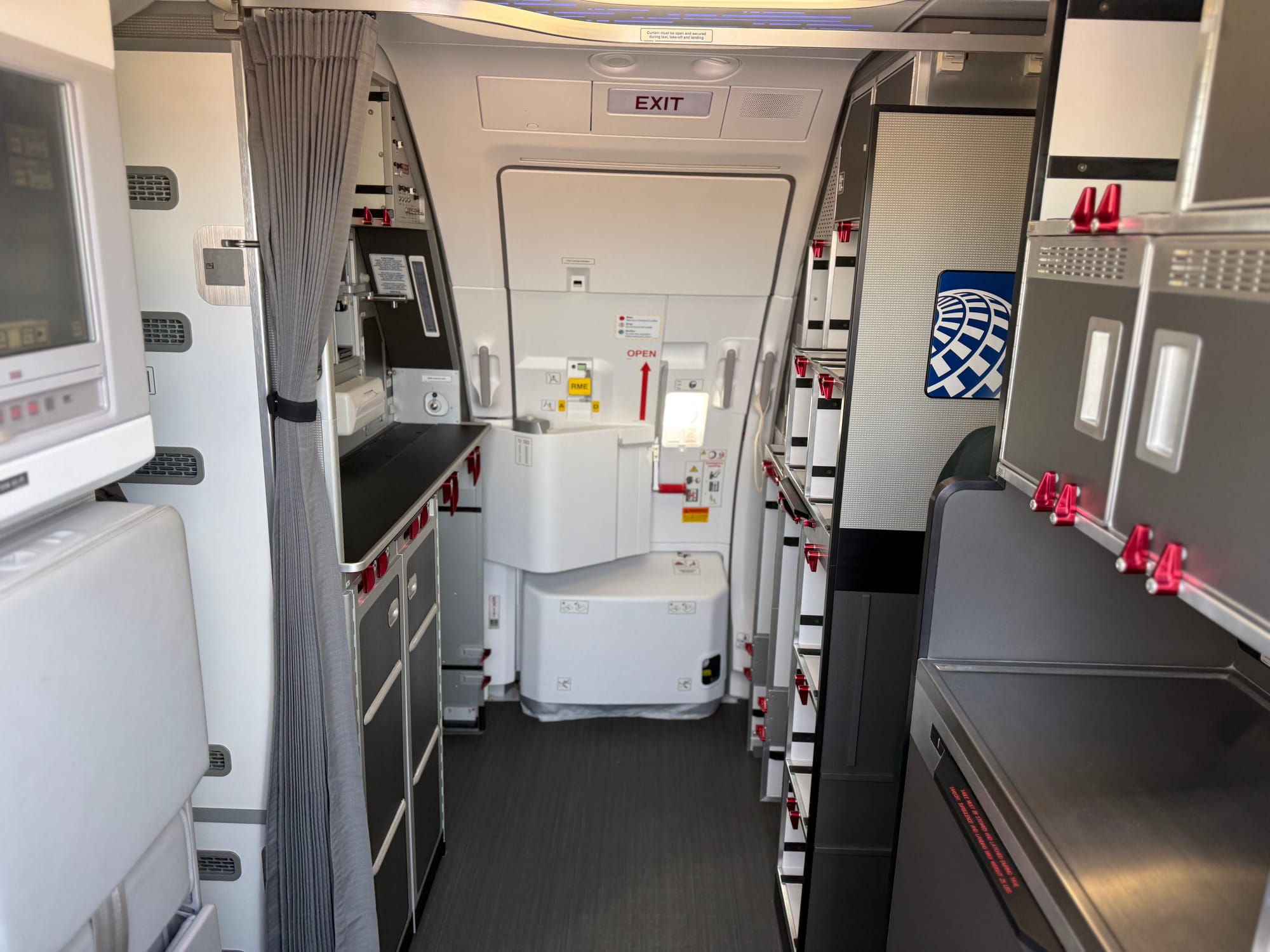 An empty forward A320neo galley, with no updated CMF, as in previous paragraph.