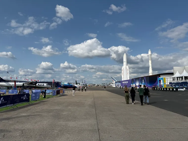 A wide shot of the static alley at Le Bourget, with the rockets and 747 on the right.