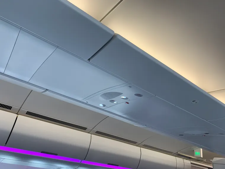 An overhead shot of an A330neo cabin, front section, without centre bins.