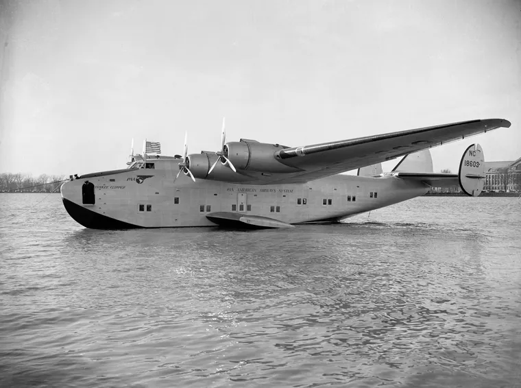 A Boeing 314 flying boat resting on the water.