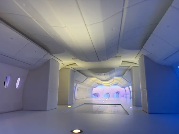 A closeup macro-style photo of the Boeing physical 777X cabin configurator.