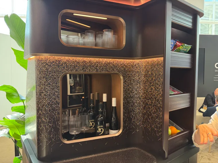 Part of the ACS UK Omnia monument, featuring metallic elements, lighting, storage, and strong design language.